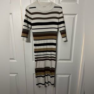 Ribbed dress material that’s perfect for the fall. Stylish and keeps you warm